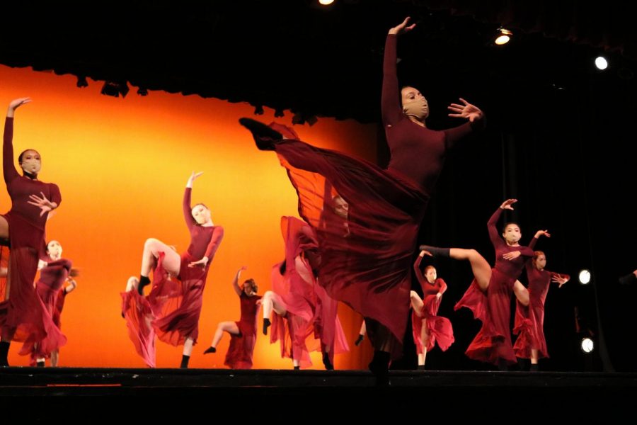 The Dancers garments flowing through the air when kicking. 