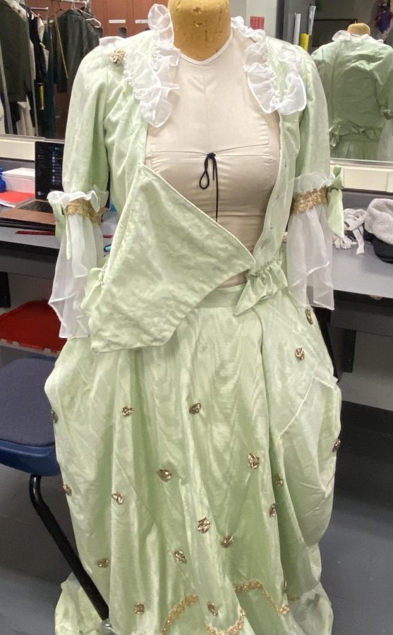 Mrs. Tottendale’s dress, which was detailed by Akyra Cambric and Ivy Stark at the time of the interview. 