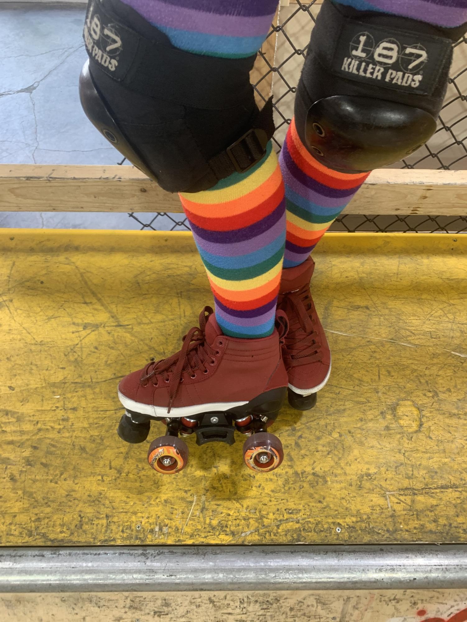 Stellar showing off her skates. Fun Fact: Most ramp skates have wider trucks and grind blocks. 
