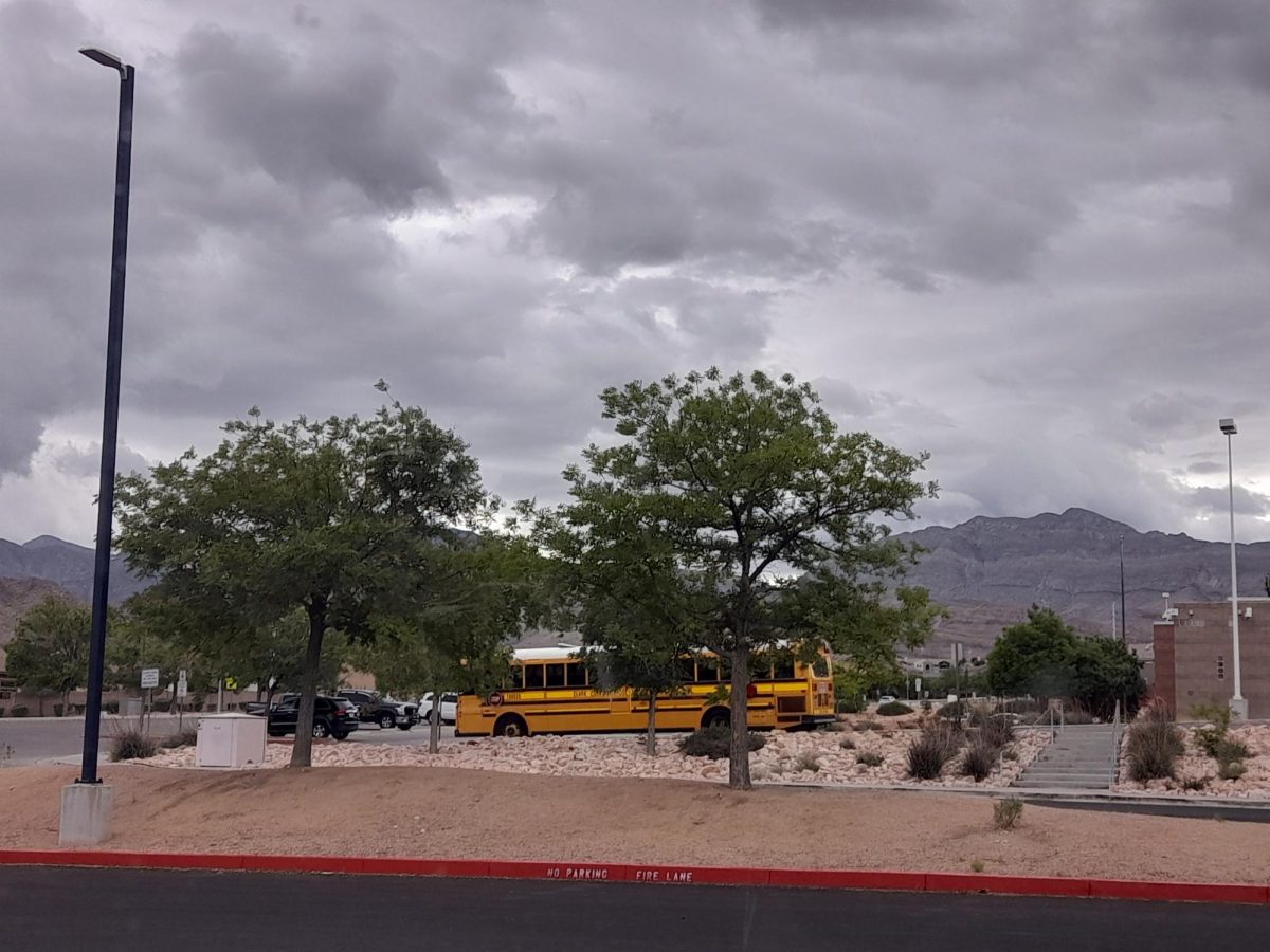 A cloudy sky signaling rain in the afternoon at the Centennial High School bus stop