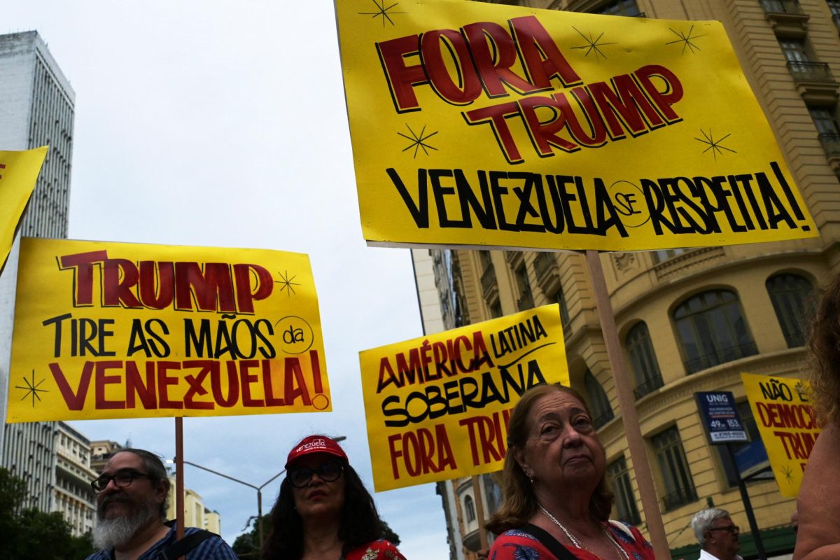 People protest in the streets with signs opposing the recent invasion and kidnapping of Venezuelan President Nicolás Maduro facilitated by US President, Donald Trump. Credit: Reuters